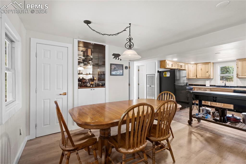 455 Golden Bell Lane Divide, CO 80814 - Photo 10 of 30 a view of a dining room with furniture