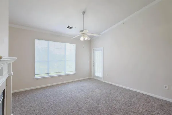 a kitchen with stainless steel appliances granite countertop a refrigerator a stove and a sink