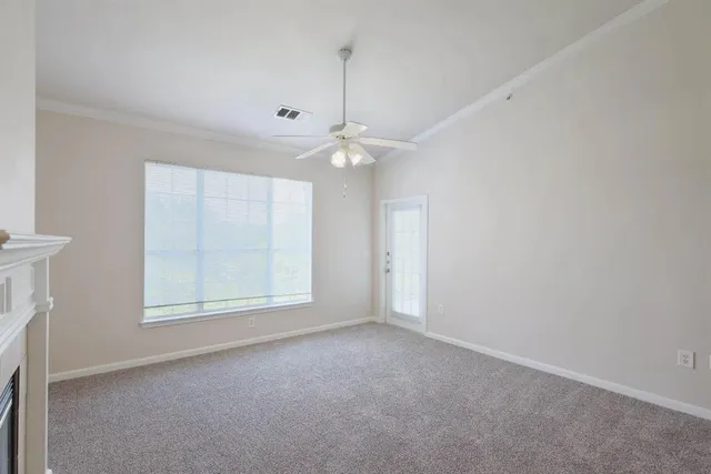 a kitchen with stainless steel appliances granite countertop a refrigerator a stove and a sink