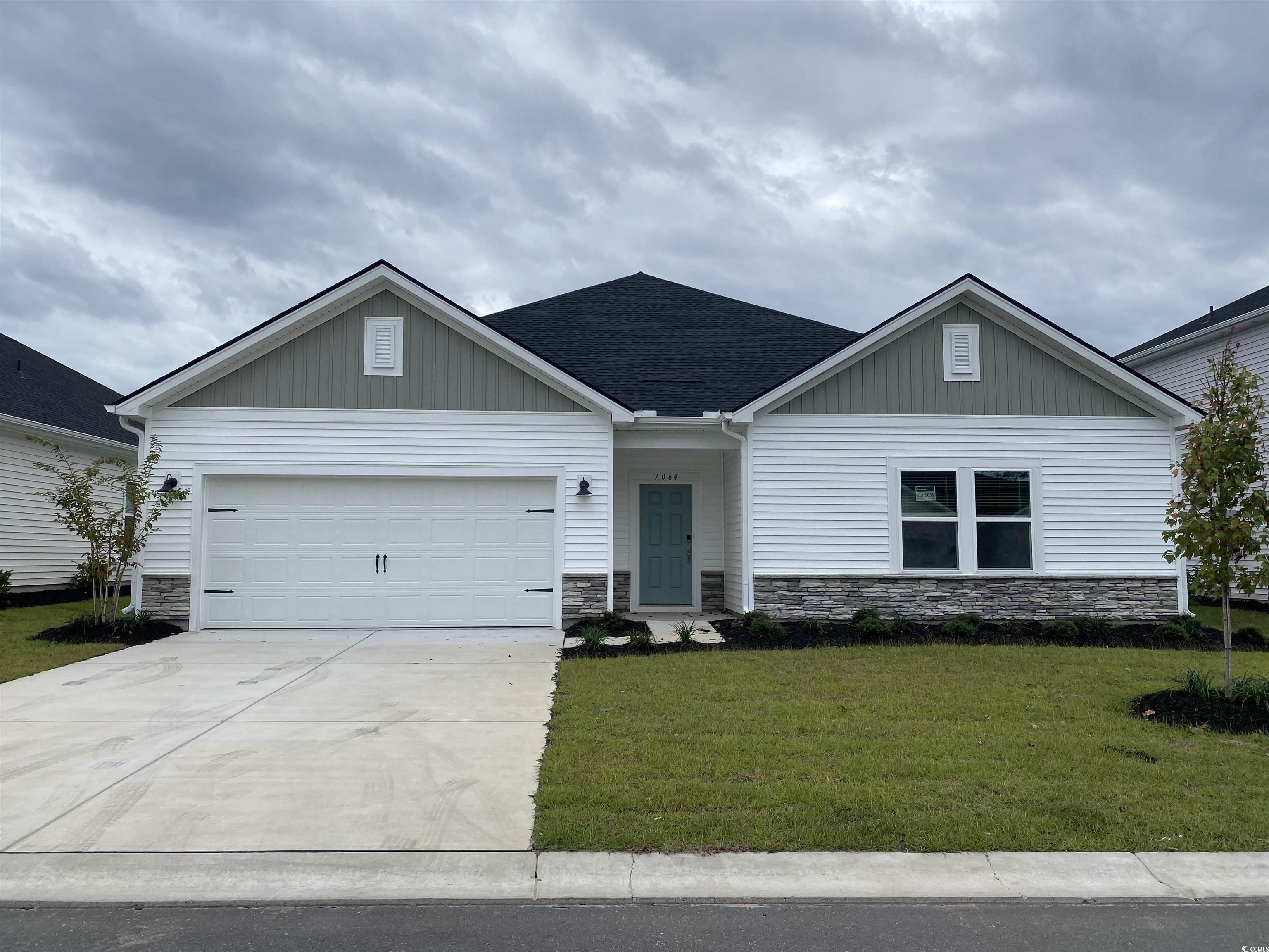 7064 Watercress Street Myrtle Beach, SC 29579 - Photo 1 of 39 View of front of property with a garage and a fron