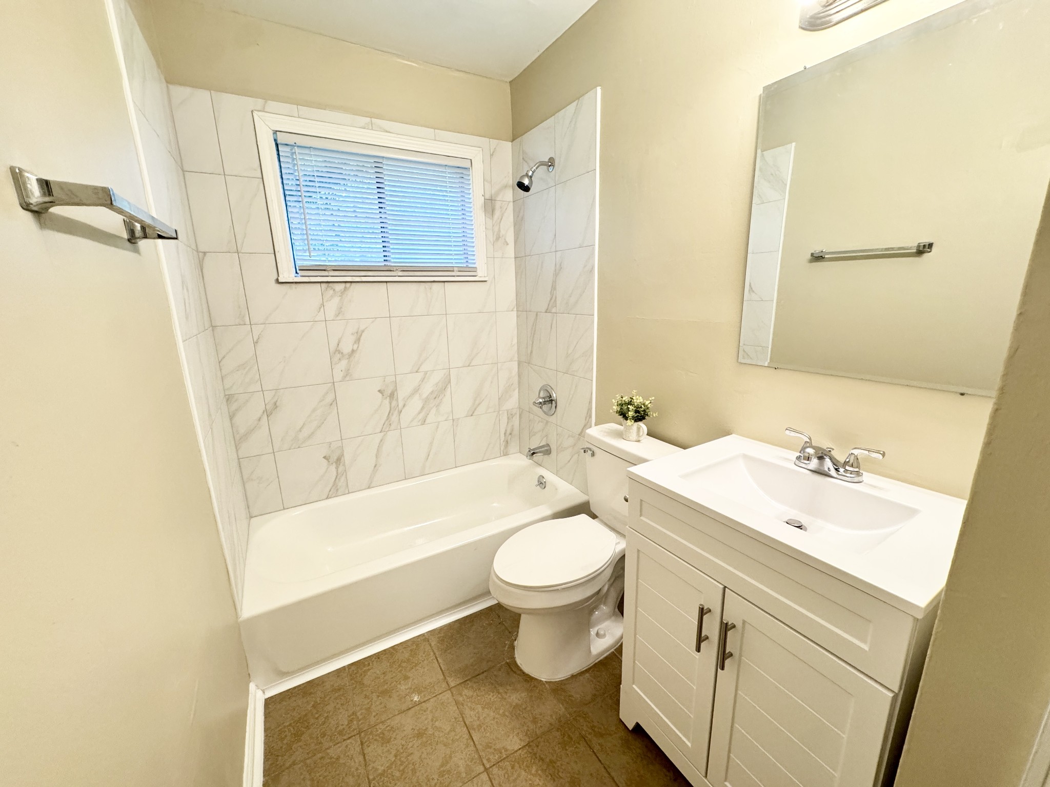 3824 Cazassa Road Memphis, TN 38116 - Photo 15 of 25 a bathroom with a sink a toilet and shower