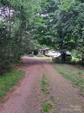 a view of street with parked cars