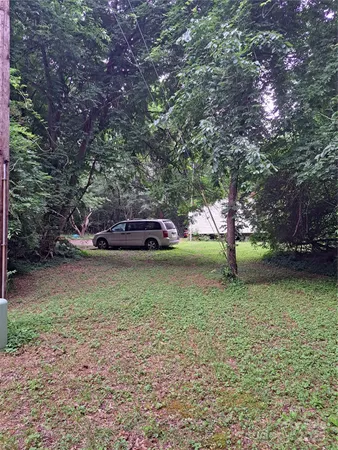 a house with trees in front of it
