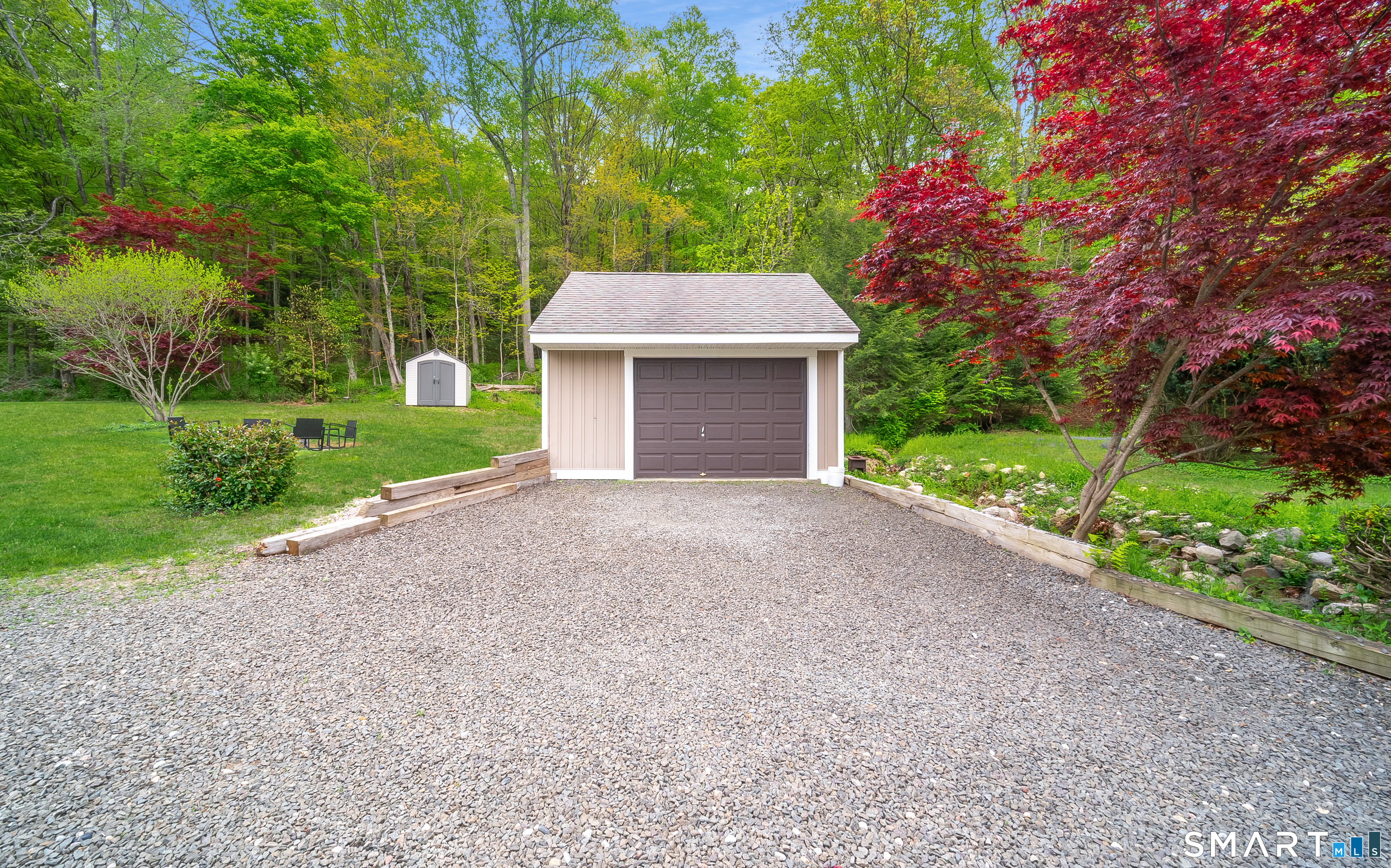 230 Killingworth Road Haddam, CT 06441 - Photo 33 of 36 a front view of a house with a yard and garage