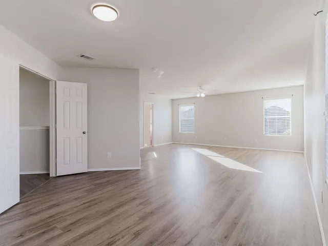 a view of a livingroom with wooden floor