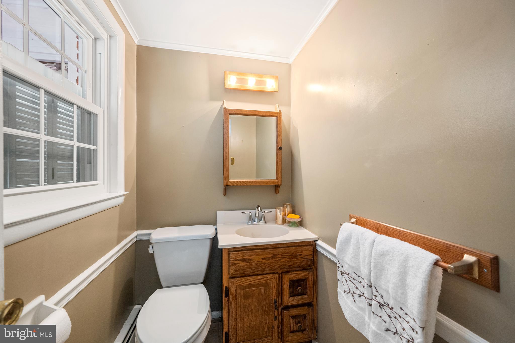 10057 Fox Den Road Ellicott City, MD 21042 - Photo 8 of 43 Powder room off family room