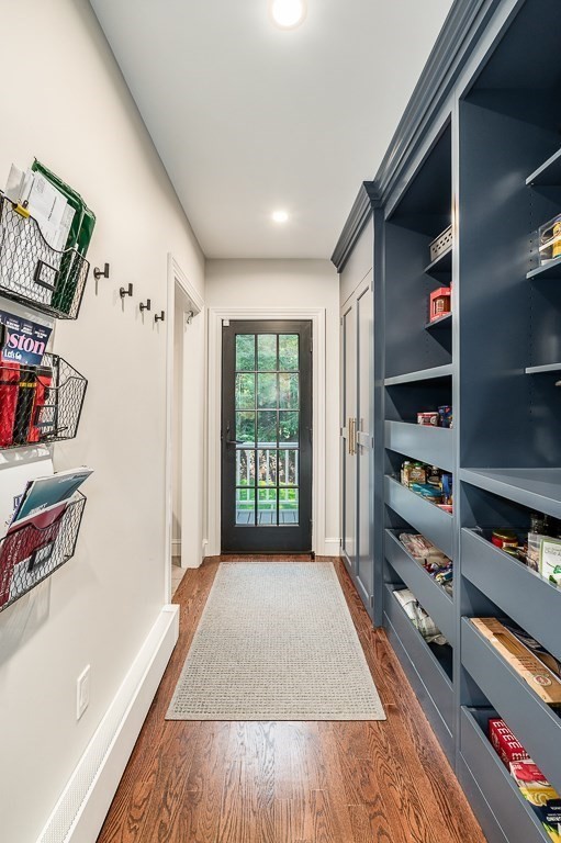 4 Bridle Path Lane Beverly, MA 01915 - Photo 12 of 42 a view of a hallway with wooden floor and windows
