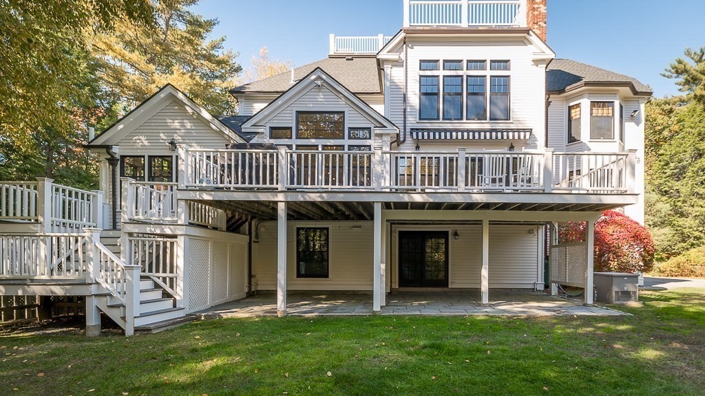 4 Bridle Path Lane Beverly, MA 01915 - Photo 31 of 42 a front view of a house with a yard and porch