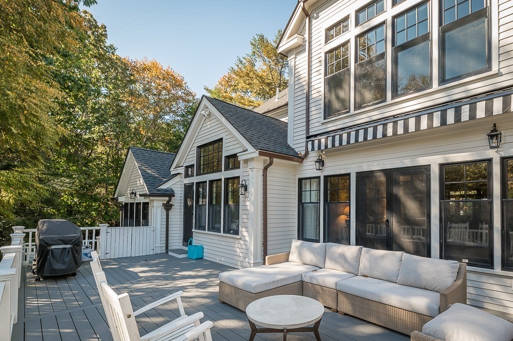 4 Bridle Path Lane Beverly, MA 01915 - Photo 10 of 42 a view of a patio with couches table and chairs and potted plants