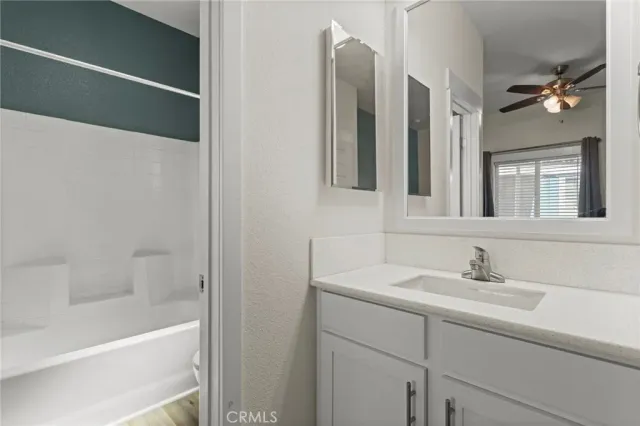 a terrace with outdoor seating and city view