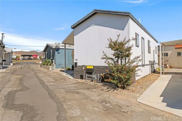 a view of a house with a street