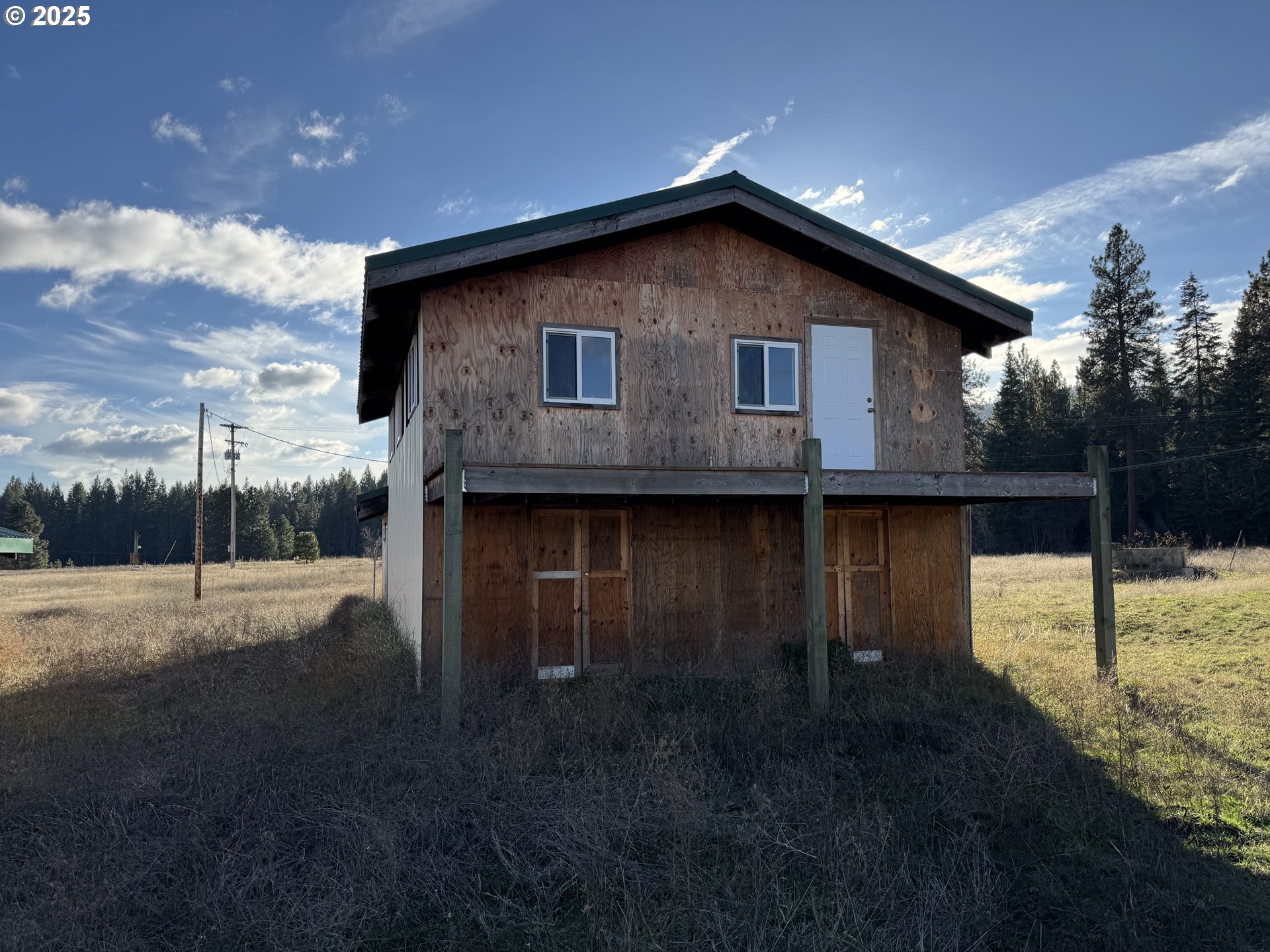 343 Little Mountain Road Trout Lake, WA 98650 - Photo 12 of 35 a front view of a house with garden
