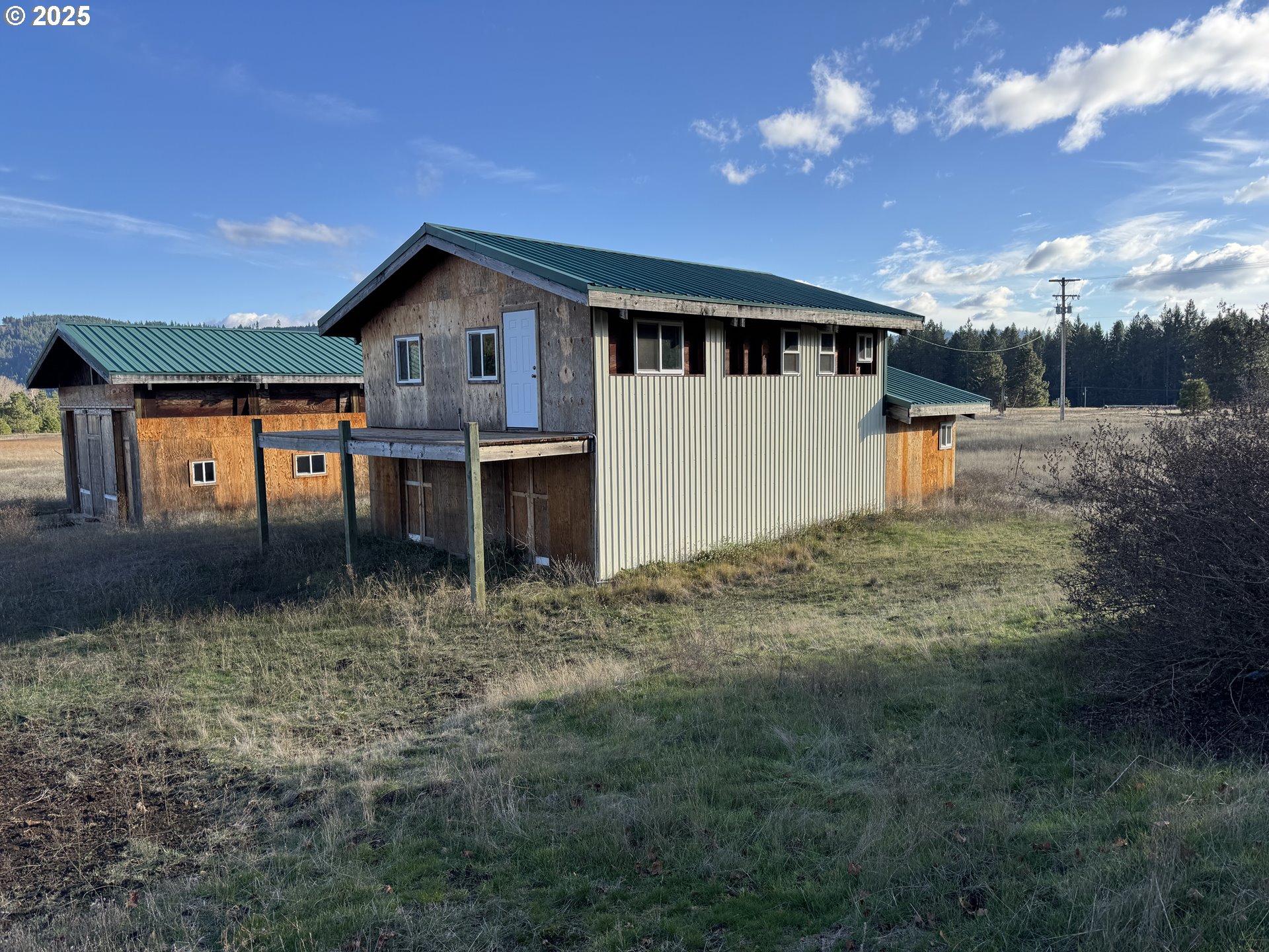343 Little Mountain Road Trout Lake, WA 98650 - Photo 9 of 35 a house view with a backyard space