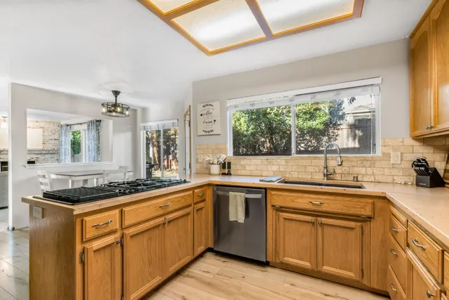 a bathroom with a sink a toilet and tub