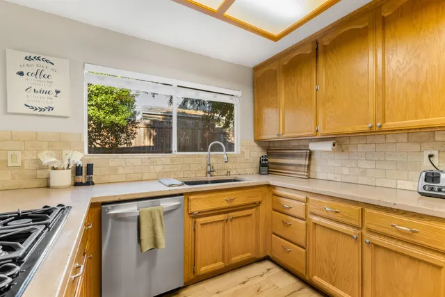 a view of a livingroom with furniture and a window