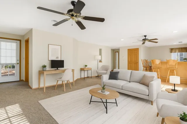 a spacious bathroom with a double vanity sink and a mirror