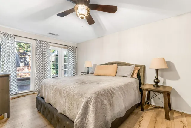a kitchen with stainless steel appliances granite countertop a refrigerator and a stove