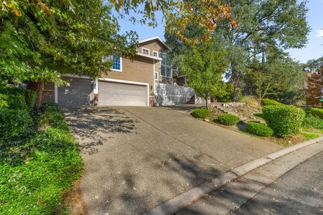a backyard of a house with lots of green space