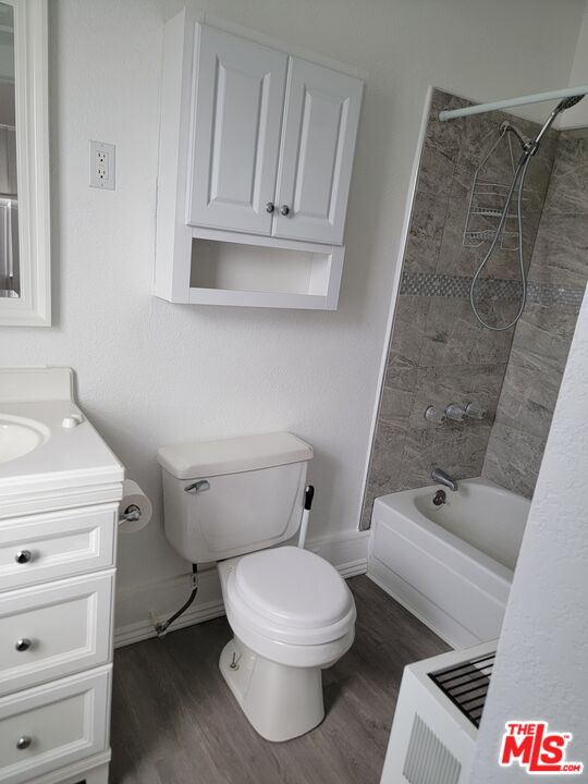 125 North Broadway, Unit 3 Redondo Beach, CA 90277 - Photo 7 of 12 a bathroom with a toilet and a sink