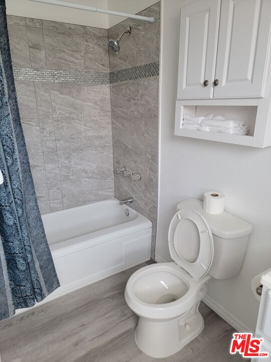 125 North Broadway, Unit 3 Redondo Beach, CA 90277 - Photo 8 of 12 a bathroom with a toilet and a shower