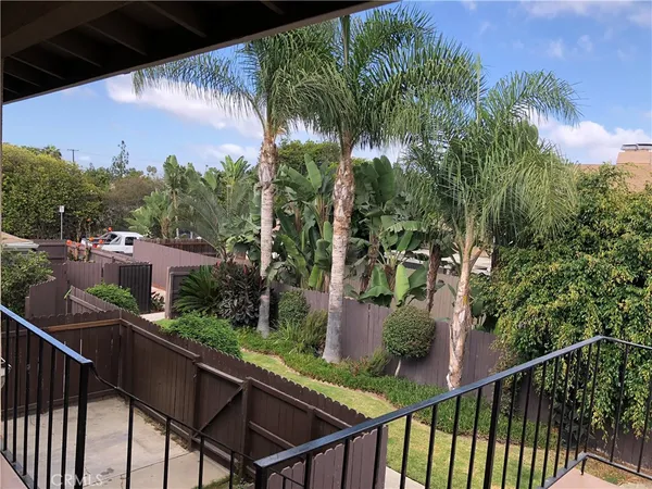 a view of a backyard of the house
