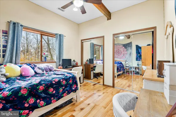 a bed room with a bed and furniture