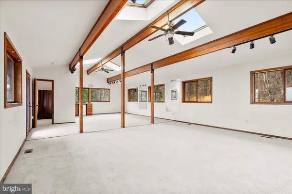 an empty room with windows