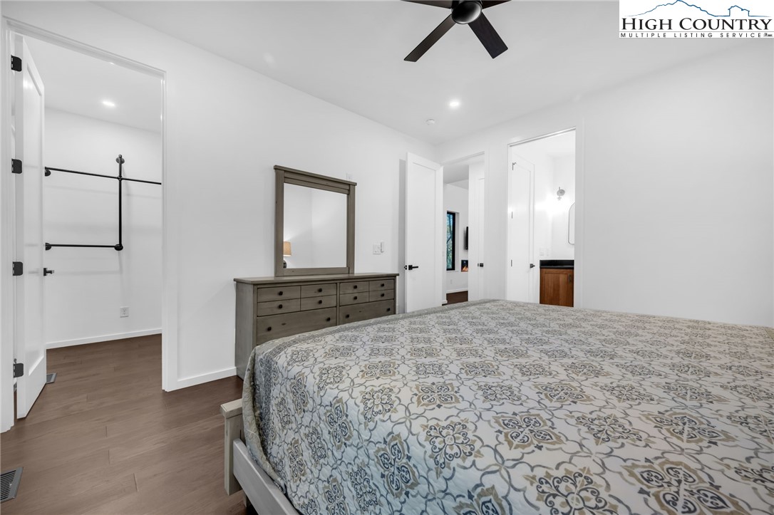 106 Jackpine Road Beech Mountain, NC 28604 - Photo 10 of 30 a bedroom with a bed and a sink