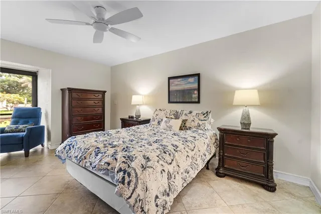 a bedroom with a bed and furniture