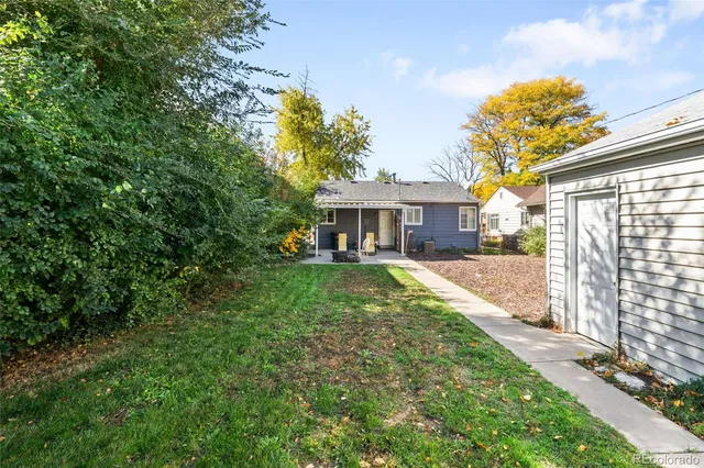 a front view of a house with a yard and porch