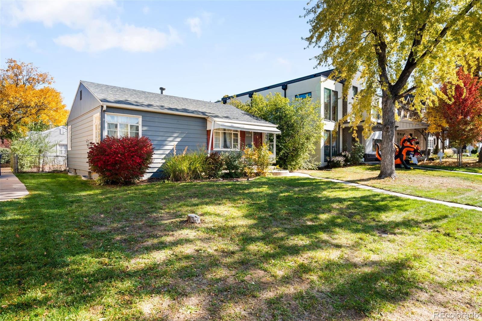 2664 South Cook Street Denver, CO 80210 - Photo 3 of 13 a front view of house with yard