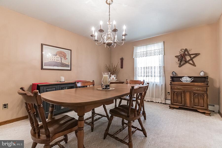 220 Robinson Road Salem, NJ 08079 - Photo 12 of 23 a view of a dining room with furniture and chandelier