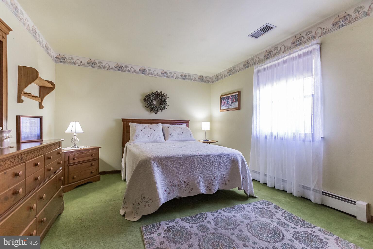 220 Robinson Road Salem, NJ 08079 - Photo 18 of 23 a bedroom with a bed and a window