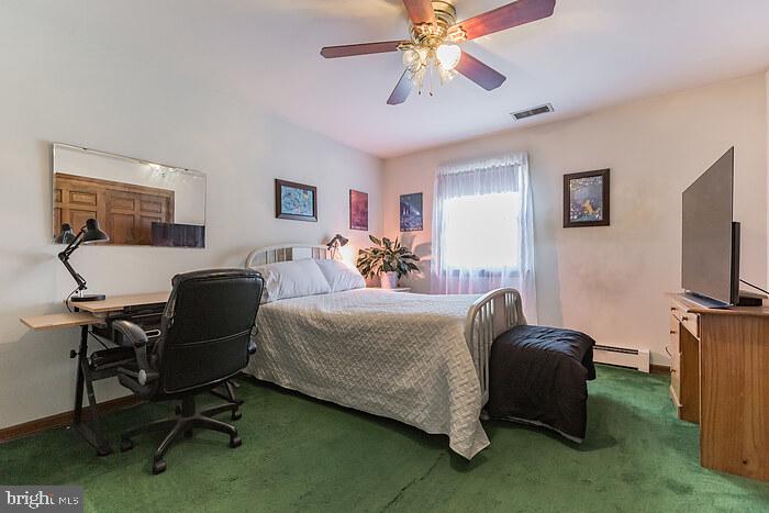 220 Robinson Road Salem, NJ 08079 - Photo 19 of 23 a bedroom with a bed and a flat screen tv