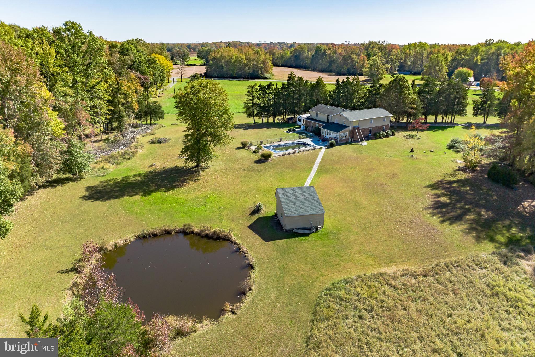 220 Robinson Road Salem, NJ 08079 - Photo 2 of 23 a view of a swimming pool with a yard