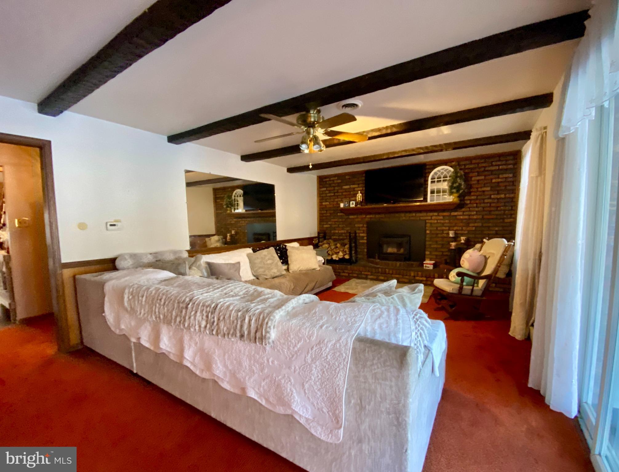 220 Robinson Road Salem, NJ 08079 - Photo 6 of 23 a bedroom with a bed and wooden floor