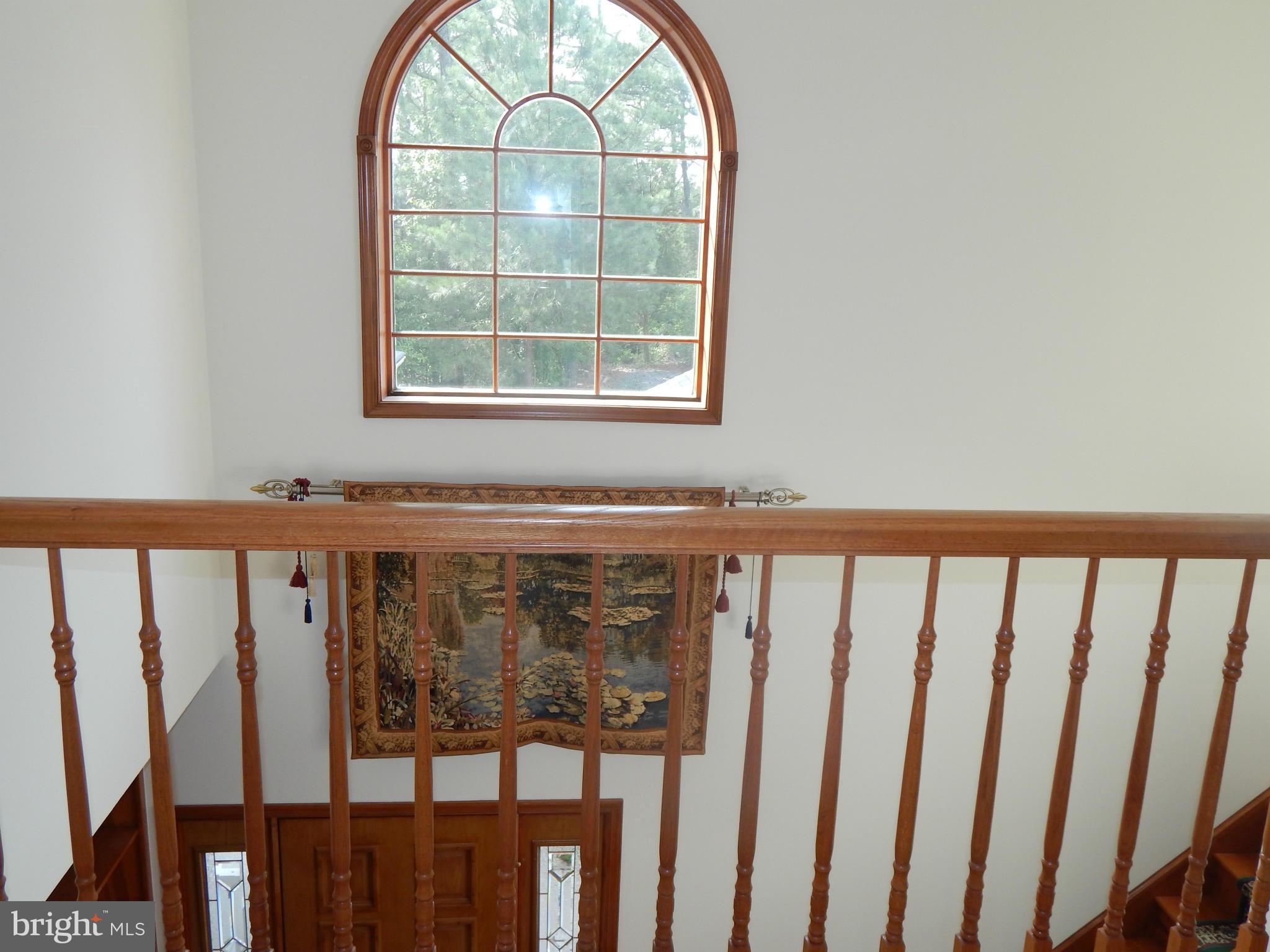 44765 Lighthouse Road Piney Point, MD 20674 - Photo 11 of 29 Front door and stairway
