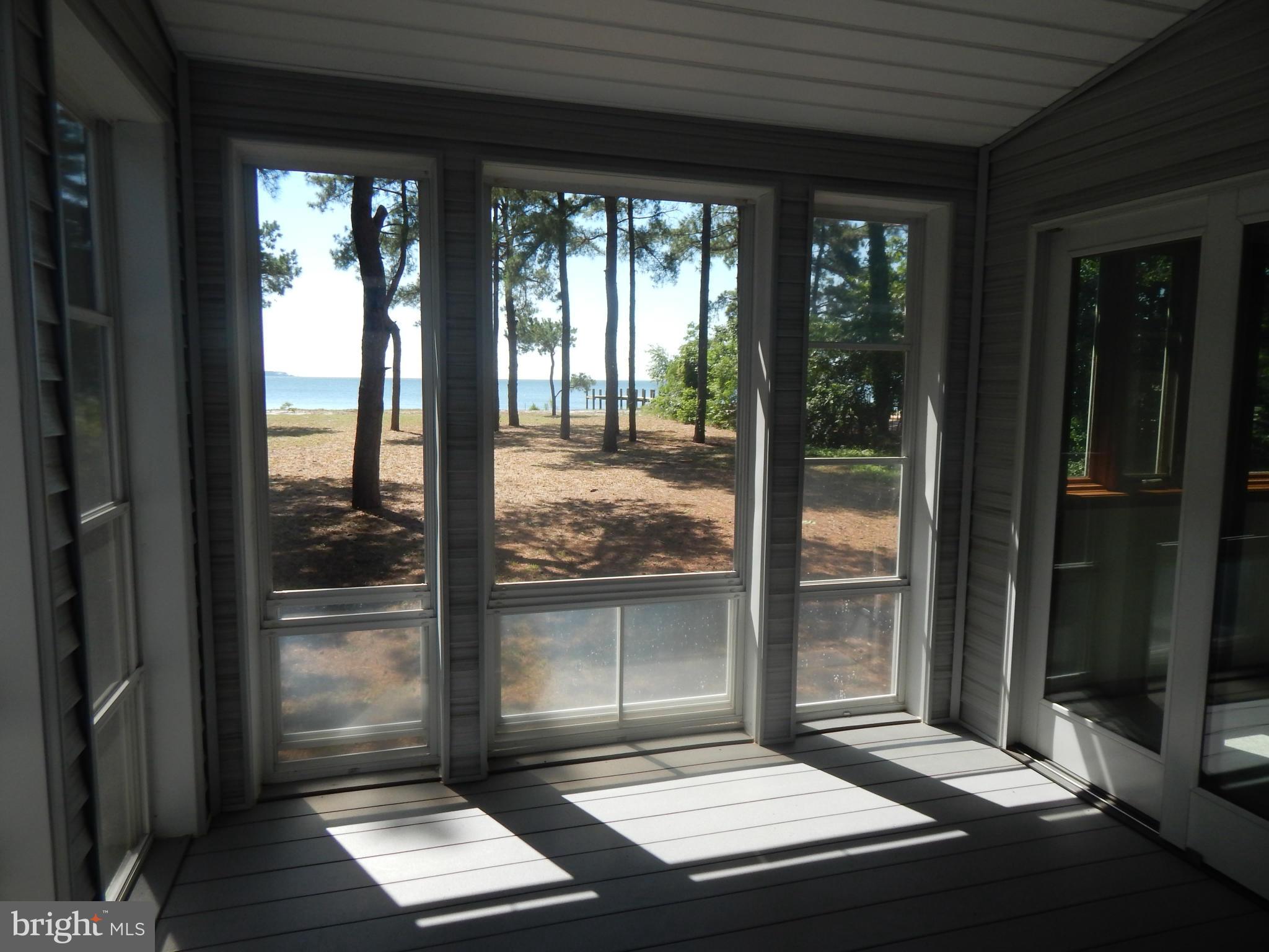 44765 Lighthouse Road Piney Point, MD 20674 - Photo 22 of 29 screened porch with glass