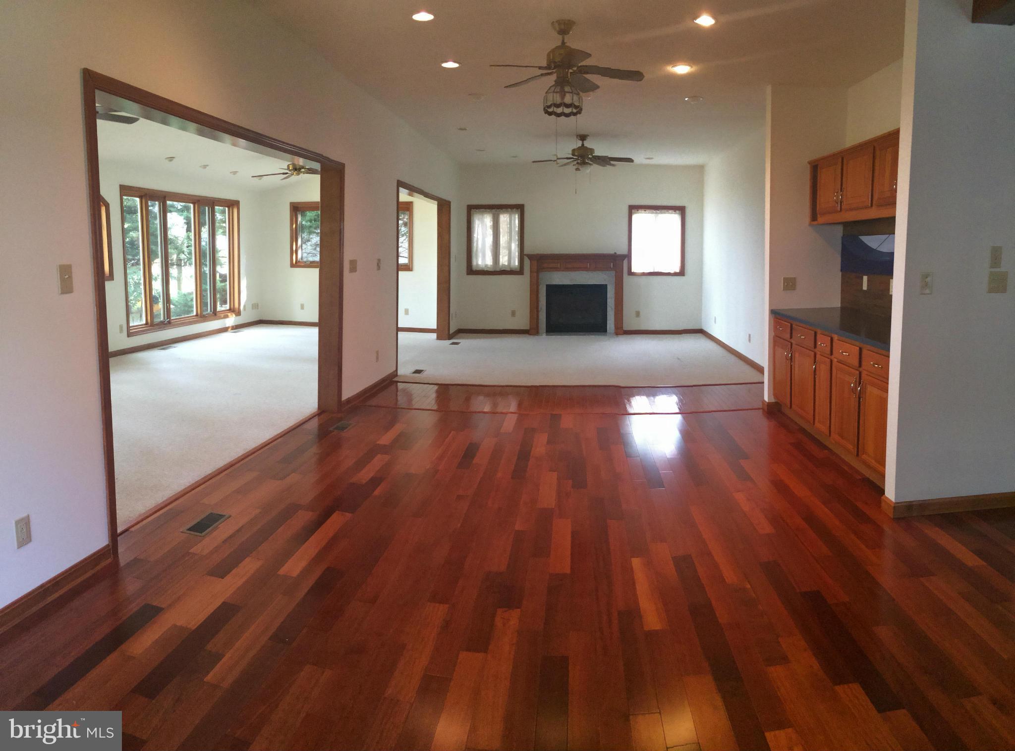 44765 Lighthouse Road Piney Point, MD 20674 - Photo 8 of 29 dining room opens up into the living room