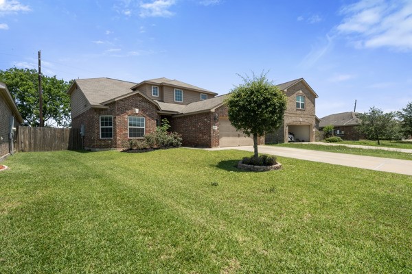 1327 Diamond Drape Drive Rosharon, TX 77583 - Photo 26 of 26 a front view of a house with a yard