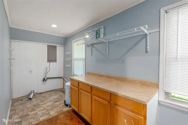 a view of walk in closet with window