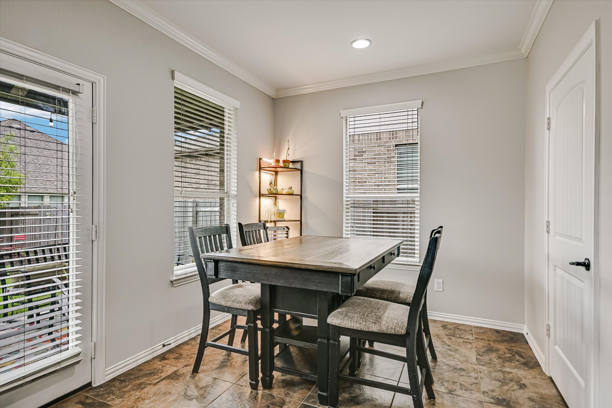 4623 Chestnut Meadows Bend Georgetown, TX 78626 - Photo 15 of 30 a view of a dining room with furniture and window