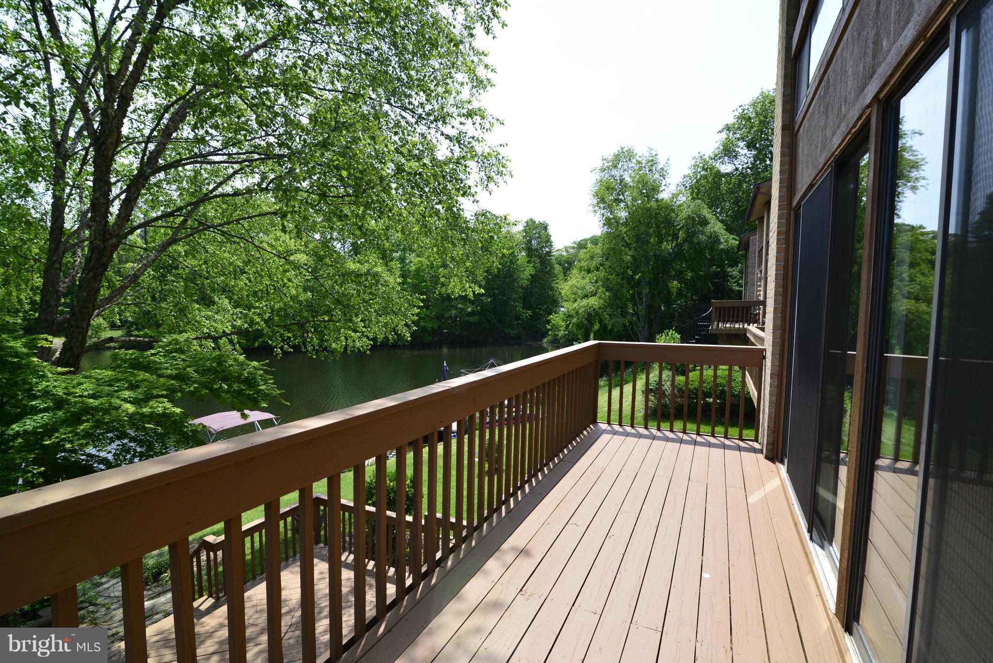 11212 Lagoon Lane Reston, VA 20191 - Photo 8 of 24 A view of the main deck off of the living room.