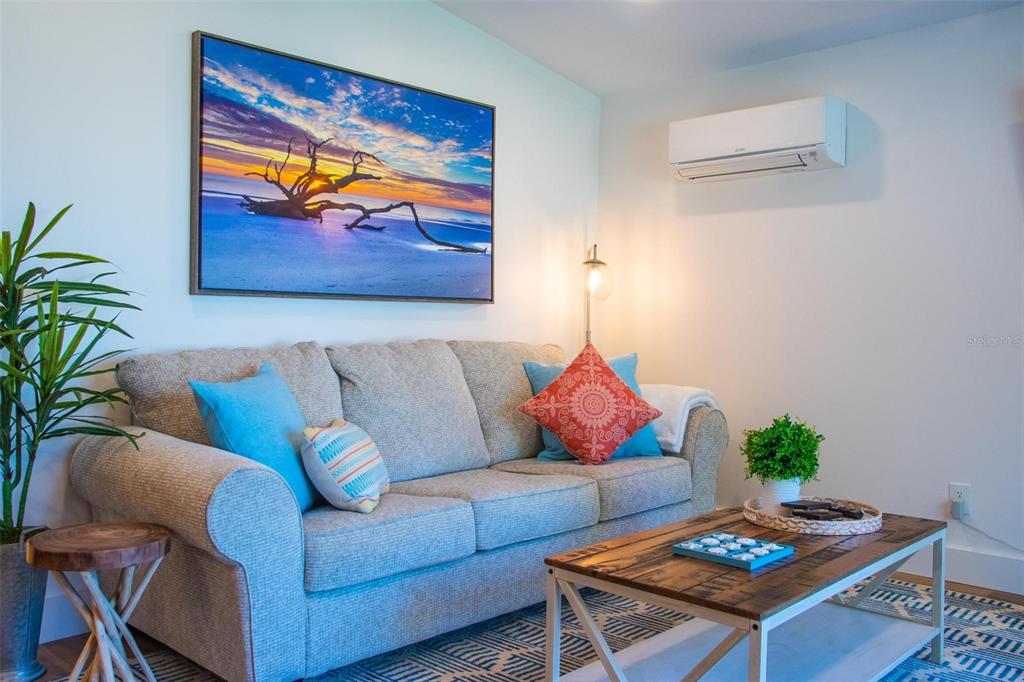 110 Terrapin Road St. Augustine, FL 32086 - Photo 12 of 33 a living room with furniture and a potted plant