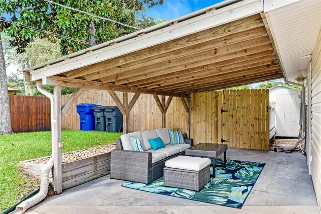 a view of a house with a backyard and a slide