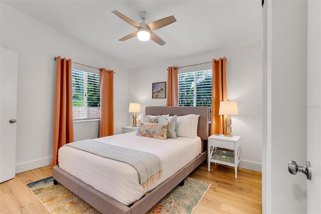 110 Terrapin Road St. Augustine, FL 32086 - Photo 21 of 33 a bedroom with a large bed and a window