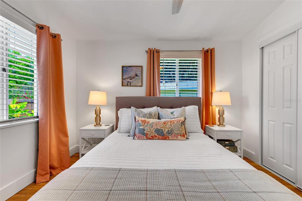 110 Terrapin Road St. Augustine, FL 32086 - Photo 23 of 33 a bedroom with a bed lamp and a window