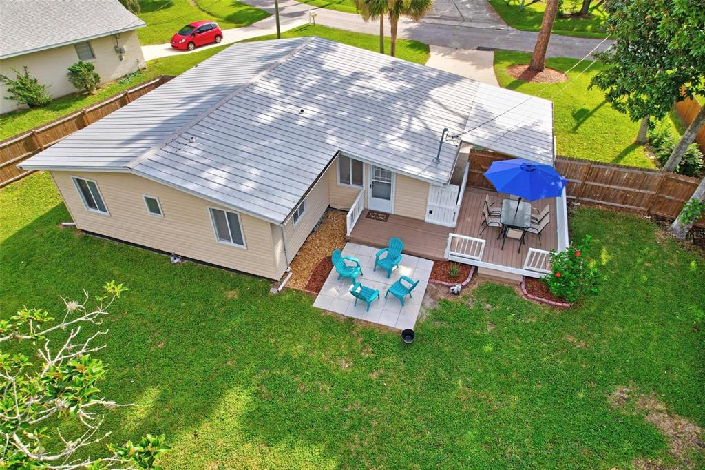 110 Terrapin Road St. Augustine, FL 32086 - Photo 30 of 33 a view of a backyard with a barn and a yard