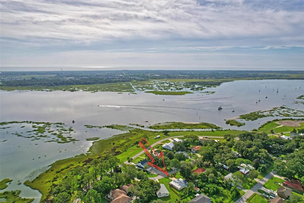 110 Terrapin Road St. Augustine, FL 32086 - Photo 32 of 33 a view of a lake with a beach