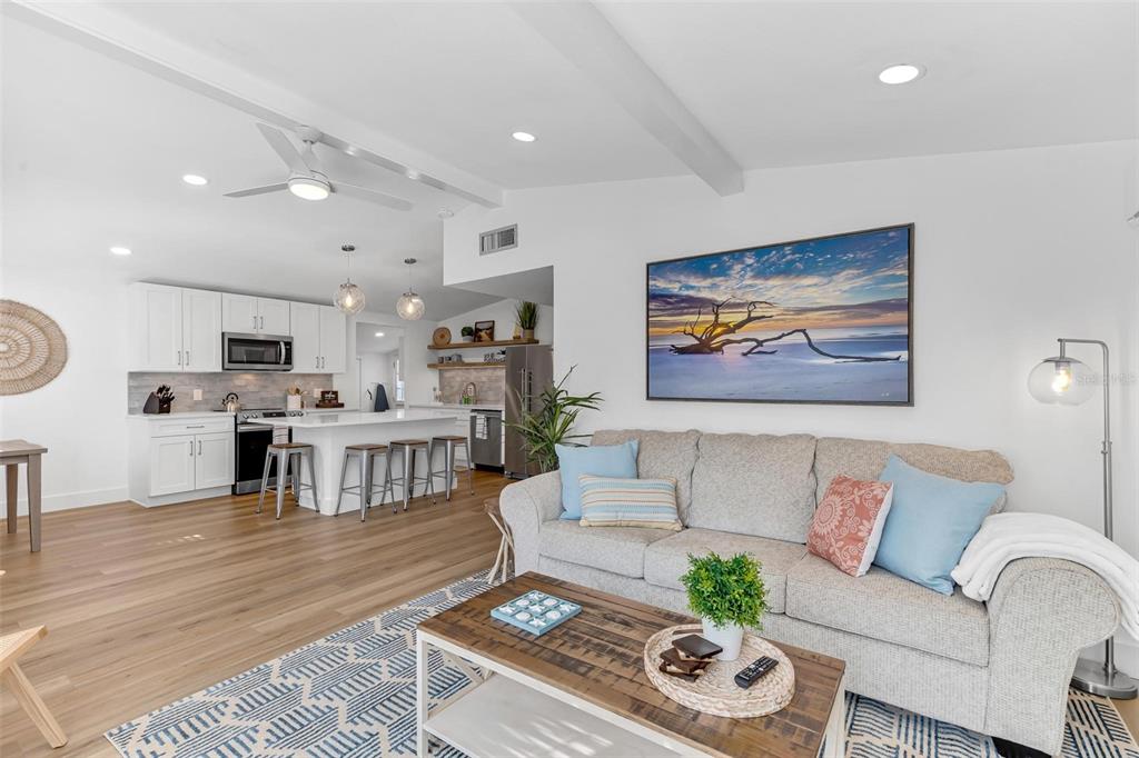 110 Terrapin Road St. Augustine, FL 32086 - Photo 5 of 33 a living room with lots of furniture and kitchen view